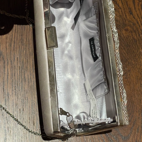 Set of matching silver Aldo heels and Le Chateau clutch - Picture 6 of 7